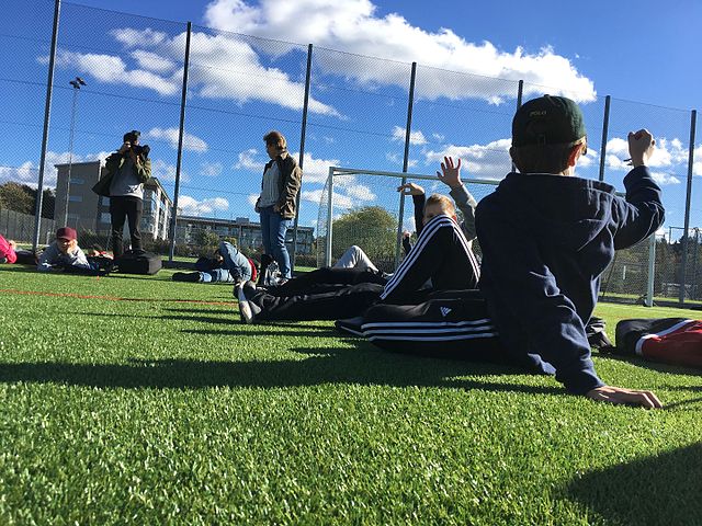 Students at the sports ground Enskede IP in Stockholm, Sweden. 