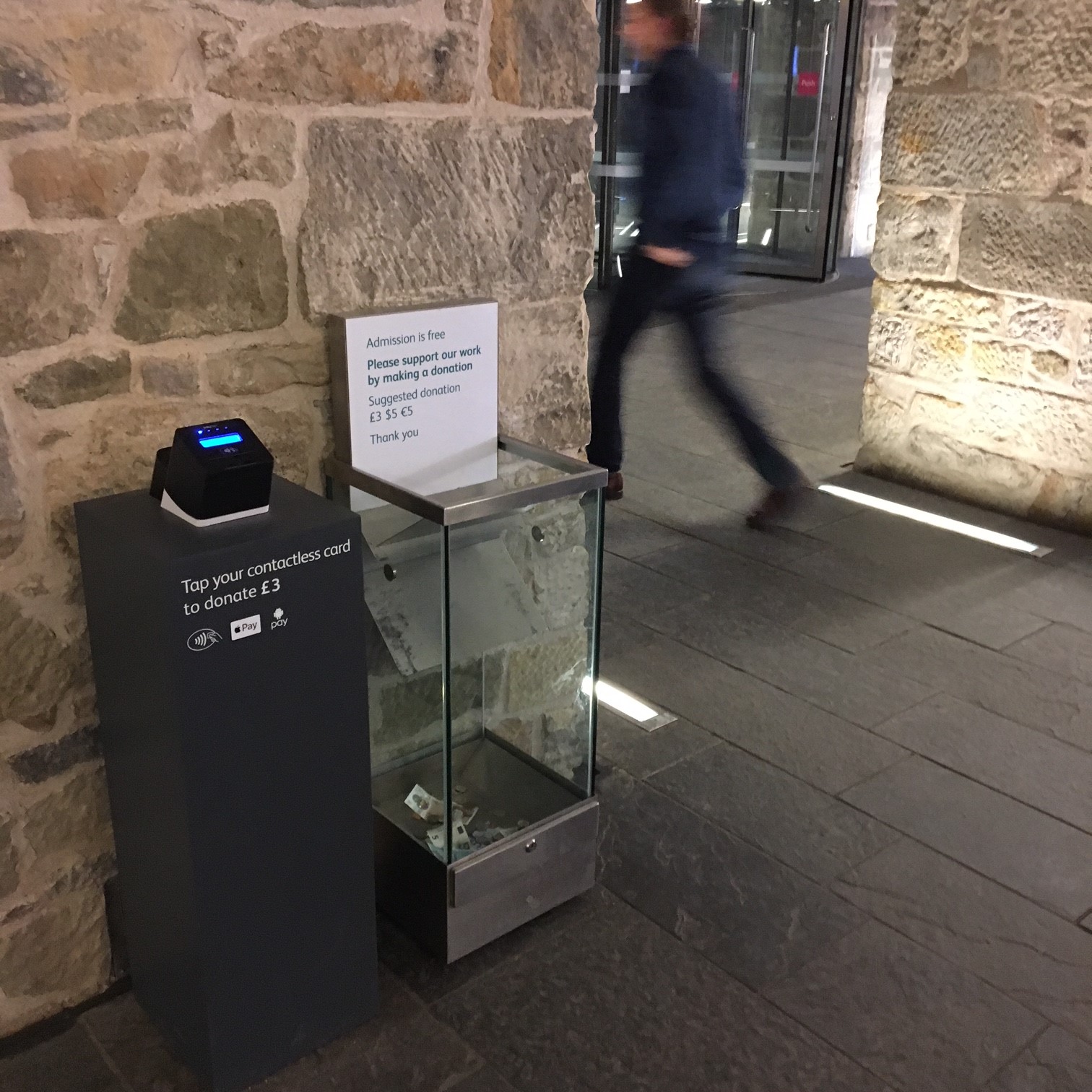 The contactless donation terminal close to the main entrance to the National Museum of Scotland
