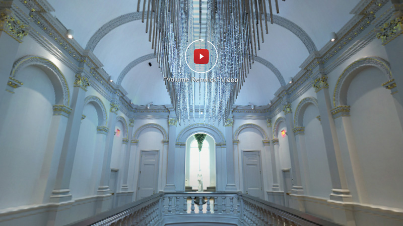 Screenshot showing white arches along central atrium of Renwick Gallery, with silvery light sculpture in center
