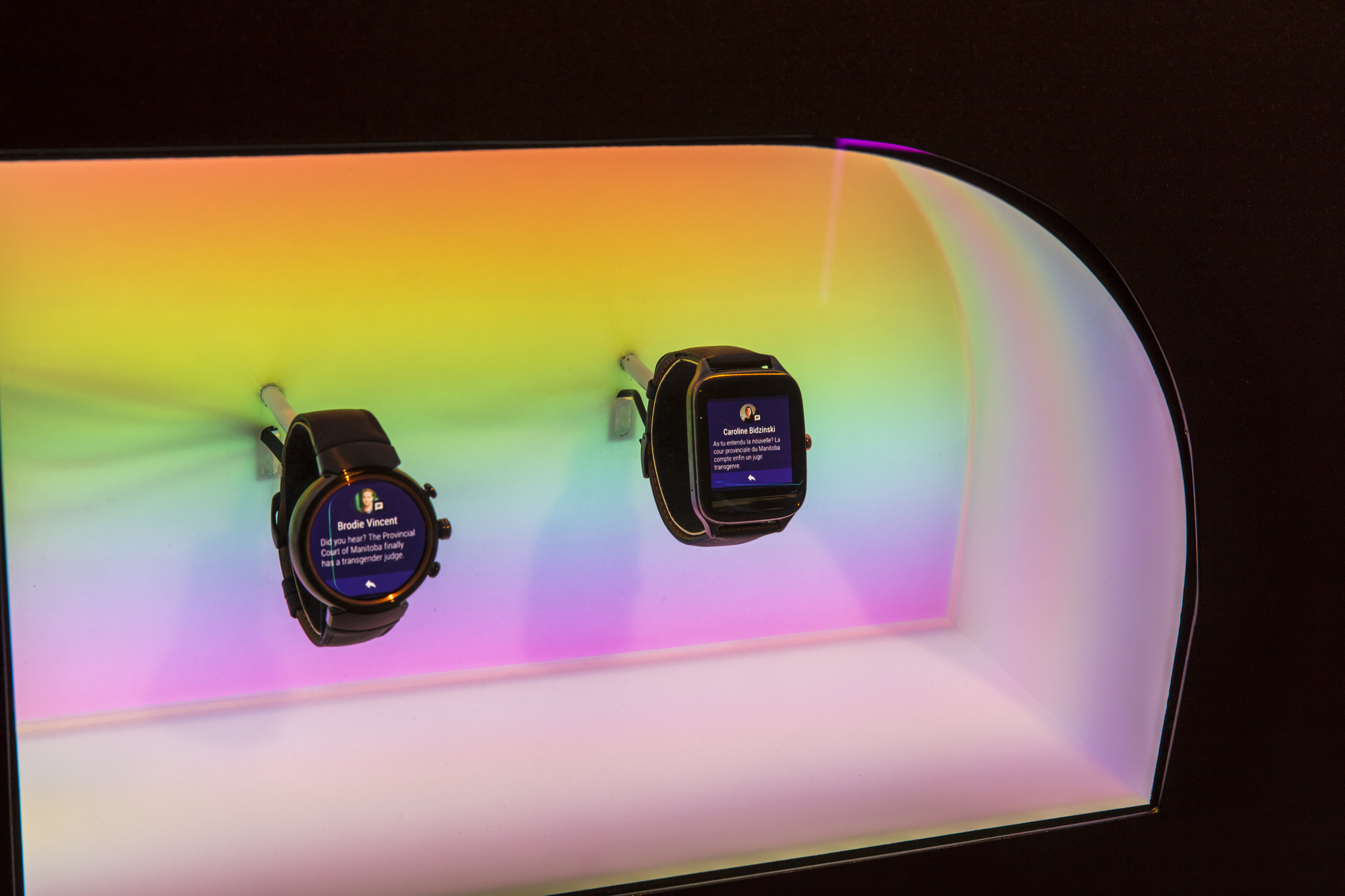 Two watches with computer screens for faces display dates and times.